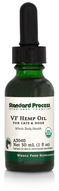 Image of a bottle of liquid VF Hemp Oil from Standard Process Veterinary Formulas next to a dropper that is included with the bottle.